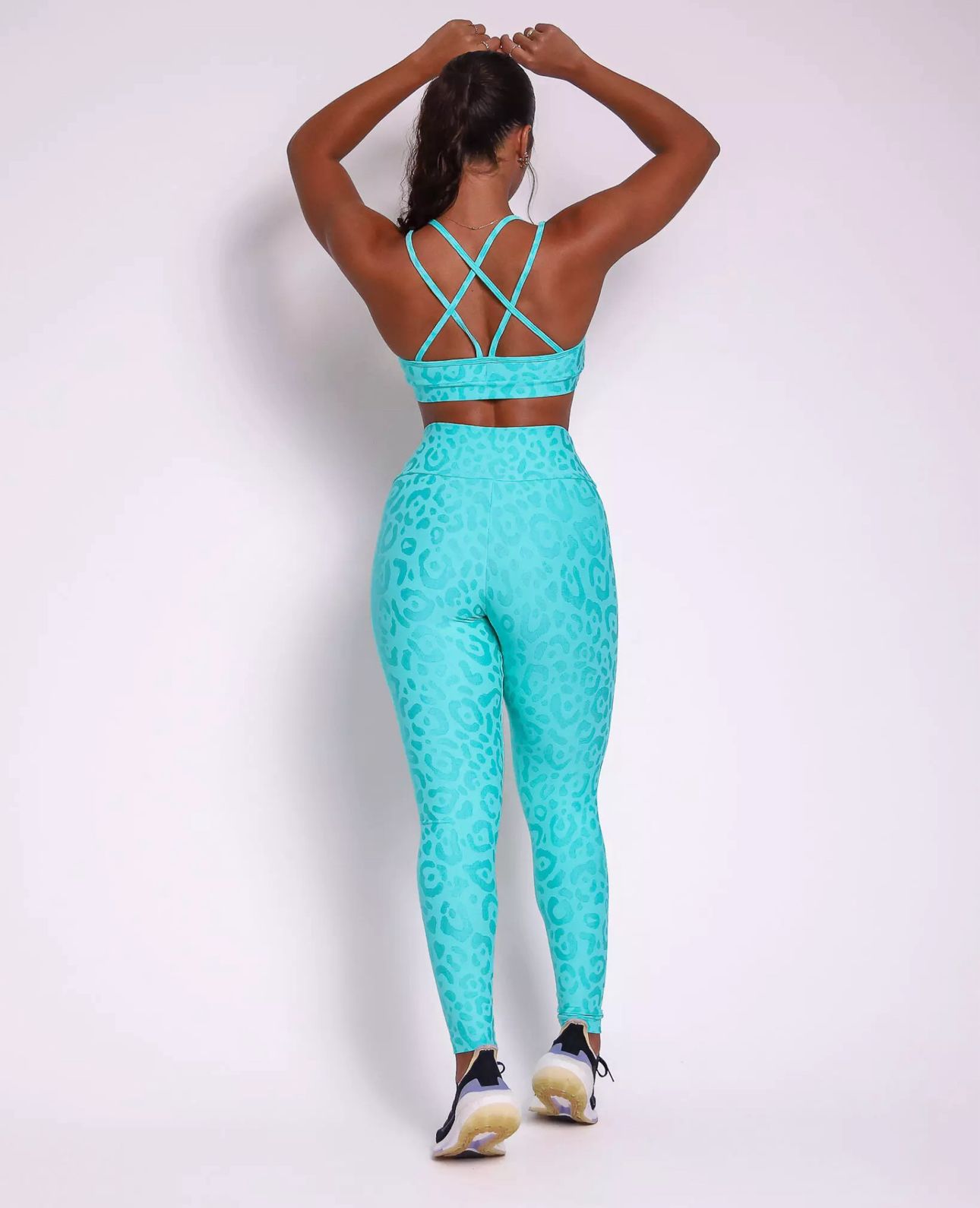 Conjunto Fitness Onça Turquesa com Top Cruzado Compressão - Imagem 4